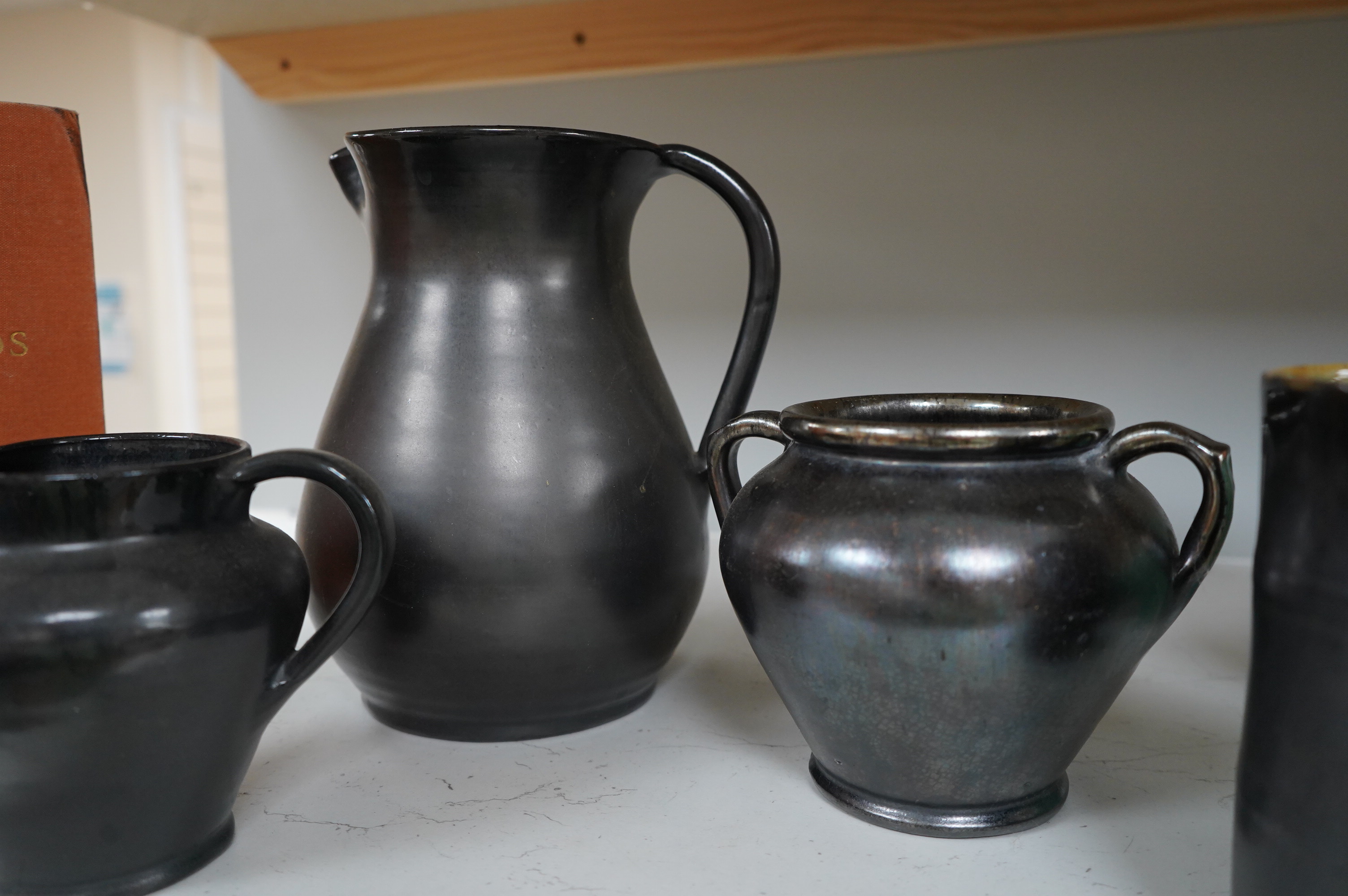 Ten items of Dickerware pottery, including a Uriah Clark and Nephew trio of connected jugs, tallest 21cm